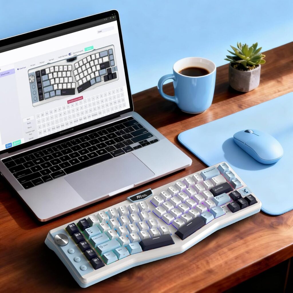 An image showing a laptop, blue cup of coffee, blue mouse pad and a blue mouse. There is also the RK A72 keyboard in view.